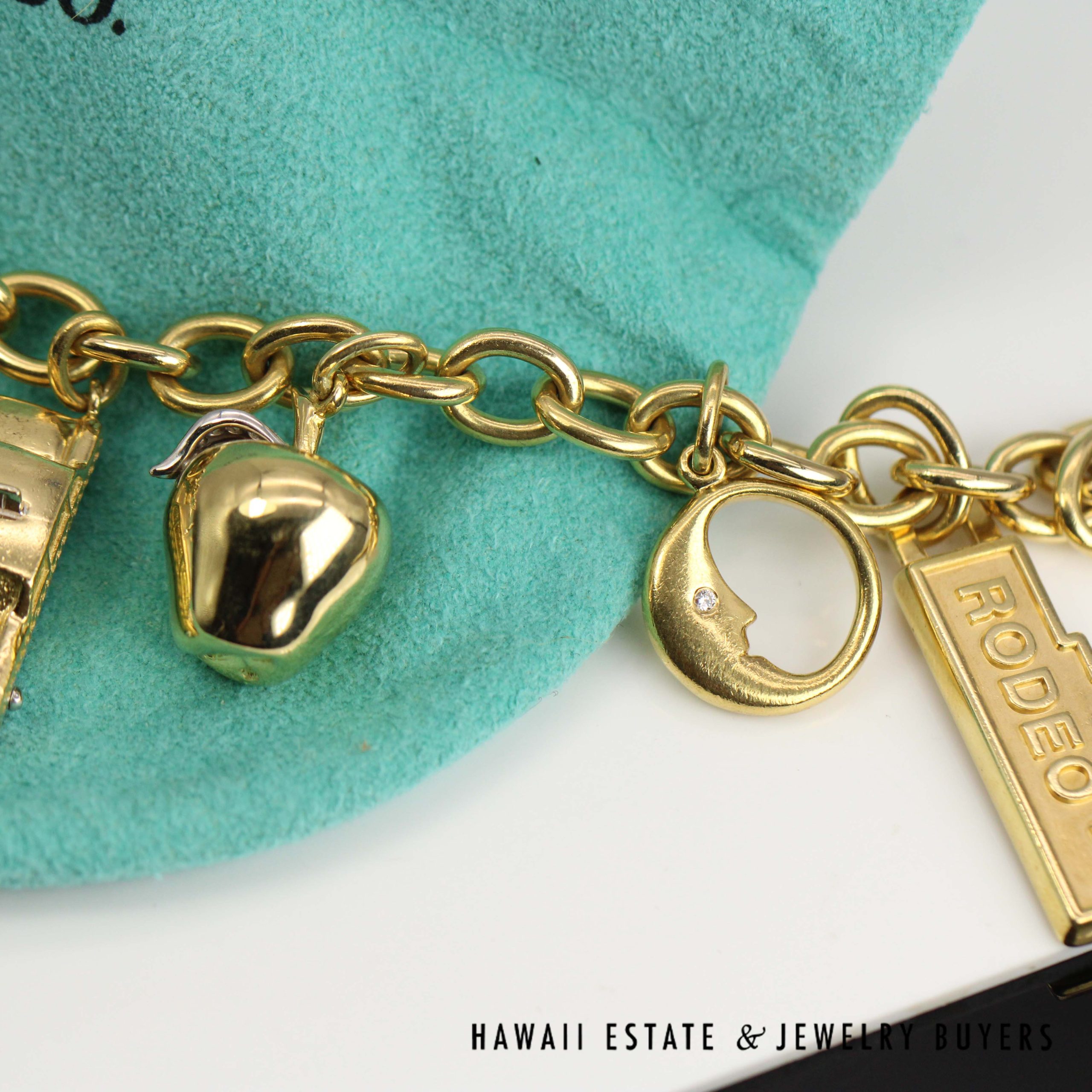 Tiffany & Co. Nine Charm Bracelet 18k Yellow Gold Size 6.75 with