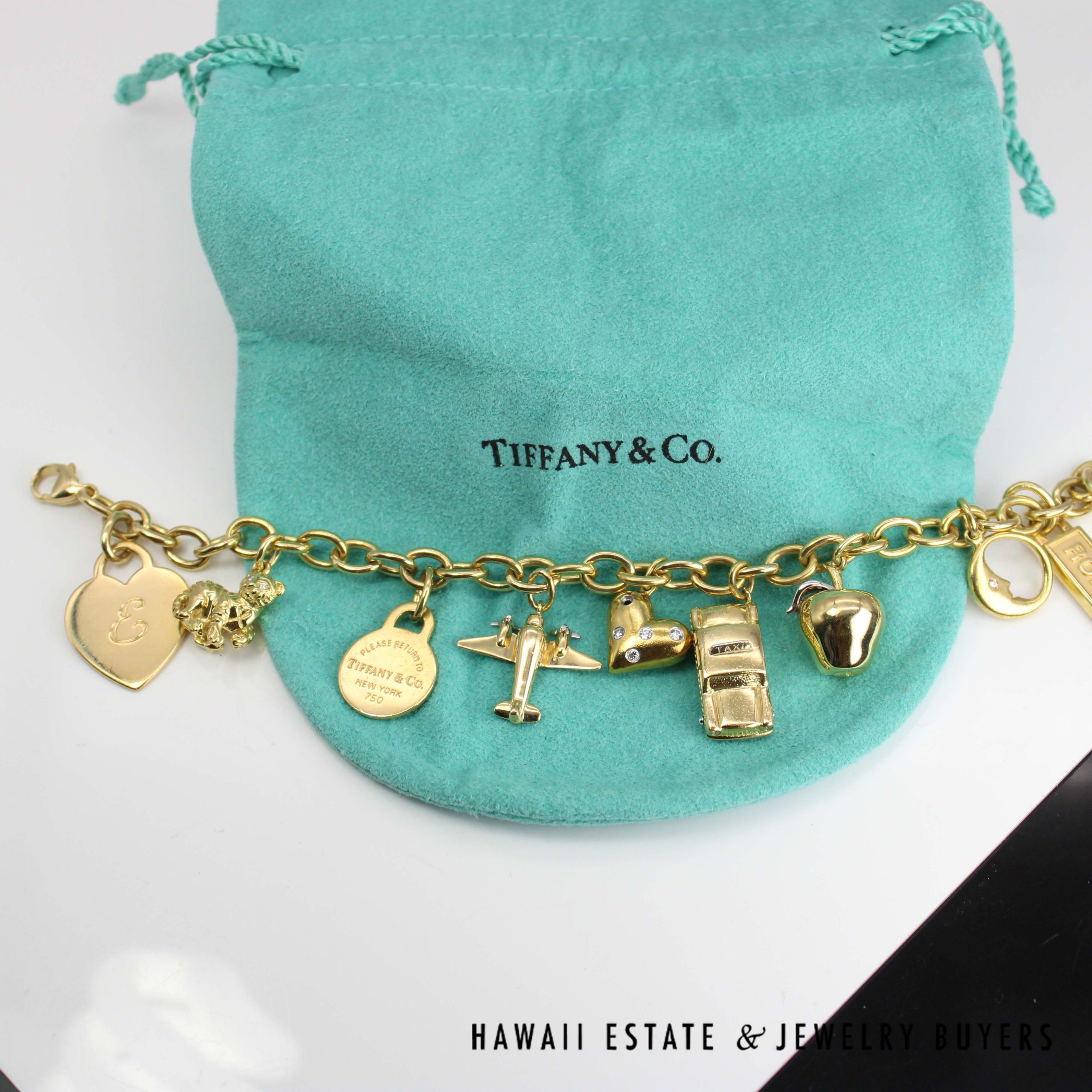 Tiffany & Co. Nine Charm Bracelet 18k Yellow Gold Size 6.75 with