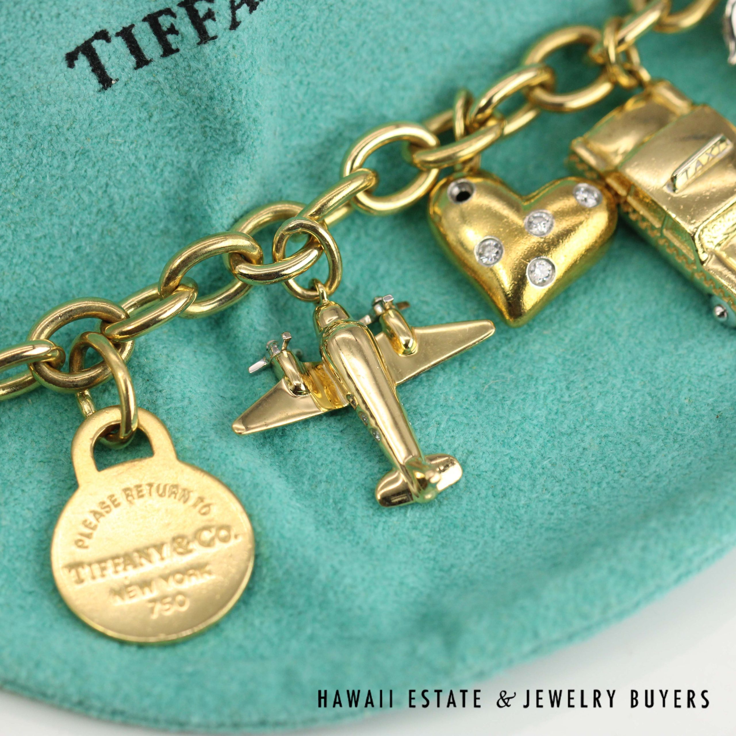 Tiffany & Co. Nine Charm Bracelet 18k Yellow Gold Size 6.75 with