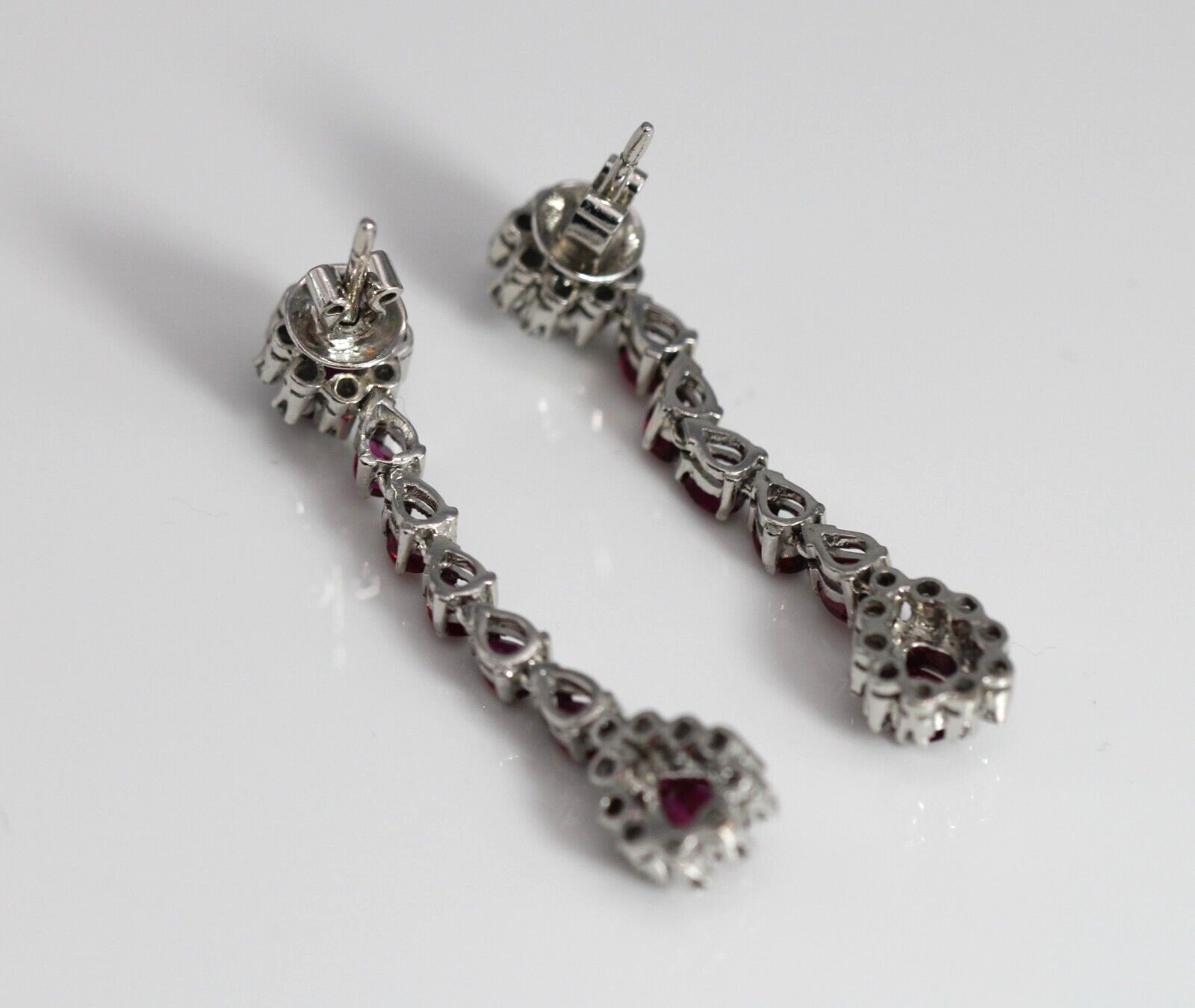 71.1g 14KWG 3.70ctw Pear Shaped Ruby & 0.36ctw Diamond Pierced Dangle Earrings - Image 5