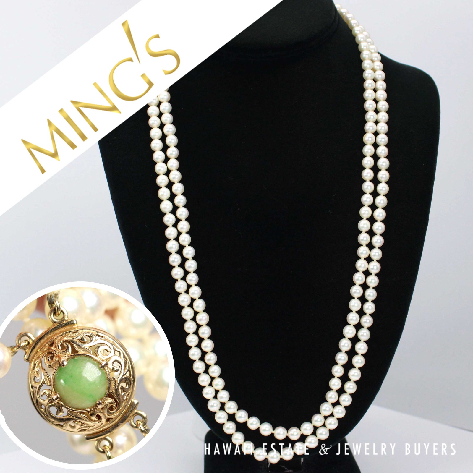 Two-strand cultured pearl necklace on a black display with an inset close view of the jade clasp.