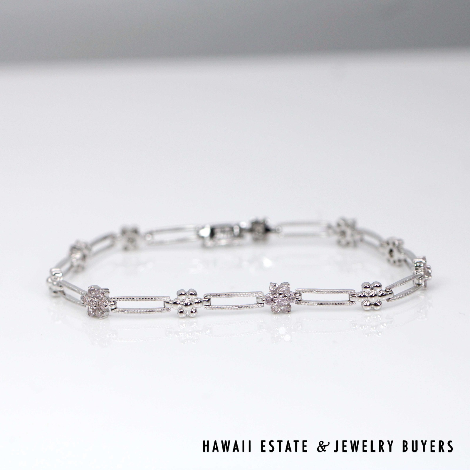 8.3g 18KWG 1.00ctw I1/GH Diamond Floral Motif Bracelet Size 7.25