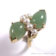 Ming's Hawaii ring with two green pear-shaped jade stones and pearl accents